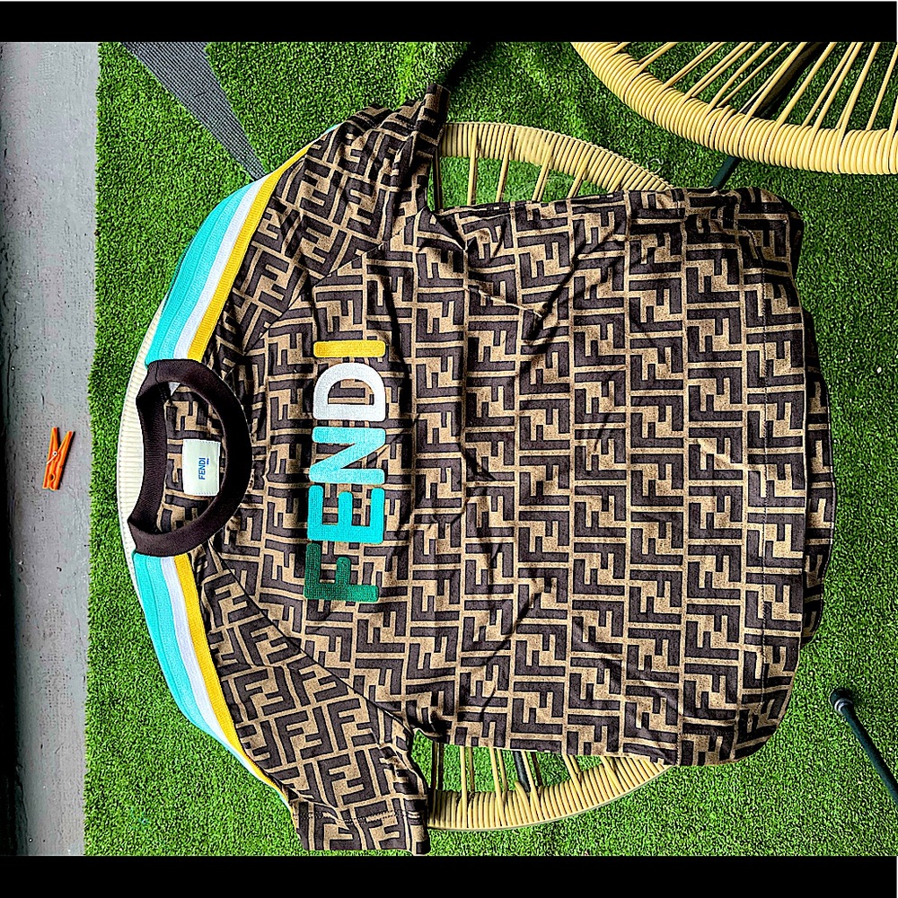 Fendi logo tee shirt . Authentic purchased from Saks worn only once .